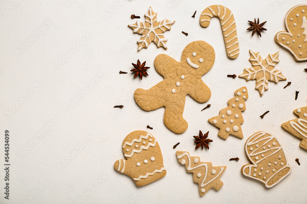 Composition with tasty Christmas cookies and spices on light background