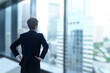 © kapinon - Businessman in a suit looking to the future