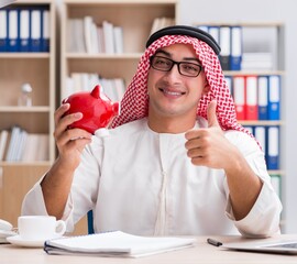 Wall Mural - Arab businessman working in the office