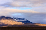 Fototapeta Góry - clouds over the mountains, Iceland