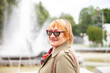 © DariaTrofimova - Elderly russian woman walking in   park.
