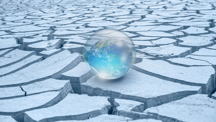 Poster - Global warming concept - Crystall ball on the dry soil with Glass Globe (Planet Earth) 