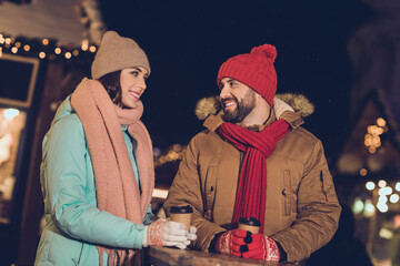 Canvas Print - Photo of charming excited wife husband walking enjoying hot beverages mugs smiling outside city fair street