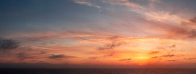 Wall Mural - Dramatic Colorful Sunset Sky over Mediterranean Sea. Cloudscape Nature Background. Panorama