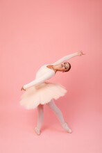 Ballerina Over Pink Background