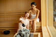 © BGStock72 - Young couple relaxing in the sauna