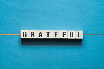 Grateful - word concept on cubes