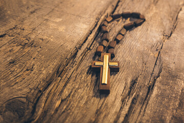 Wall Mural - Wooden cross on the table