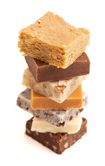 Wall Mural - Stack of Six Different Types of Fudge on a White Background