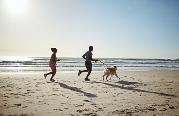 Wall Mural - Fitness, running and dog with couple at beach for freedom health and summer exercise. Sports, wellness and relax with man and woman runner with pet by the ocean for travel, support and peace workout