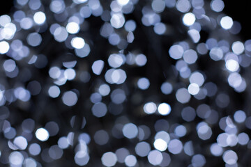 Wall Mural - Defocused grey abstract bokeh lights background. christmas