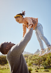 Wall Mural - Father lifting kid in air at park, garden and nature outdoors for fun, bonding and quality time together as black family. Dad throwing girl child in in sky while playing with love, care and relax