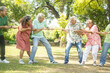 © GAJENDRRA BHATI  - Group Of Senior Indian People Playing Tug War Outdoor In Park. Retirement life.