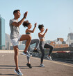 © N F/peopleimages.com - Diversity, fitness friends or runner stretching in city for marathon, running exercise or sports workout. Wellness, teamwork health or group of athlete training for warm up , sport or street race