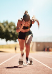 Woman runner, competition race and athlete performance, power and cardio fitness on stadium running track. Motion blur of marathon sports training on race track, arena event and fast speed action