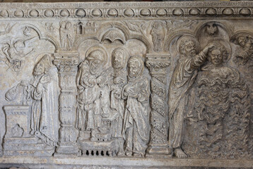 Wall Mural -  Monumental baptismal font, with a rectangular bath surmounted by a small temple. The baptistery dates from 1267. Cathedral of Saint Cerbonius in Massa Marittima. Italy