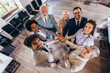 © Mediteraneo - Business team showing unity with their hands together