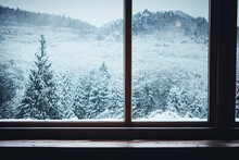 Frozen Snowy Winter Scene Through Window