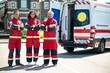 © zinkevych - Joyous paramedics in the uniforms standing outdoors