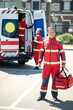 © zinkevych - Serious ambulance doctor waiting for his work shift outdoors