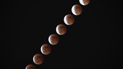 Wall Mural - After a total lunar eclipse, a partial lunar eclipse is in progress