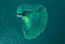 Aerial View Of Fisherman Fishing In Sea