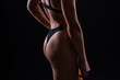 © Ivan Zelenin - Close-up shot of young woman waist with muscular abdominal muscles. Abs of fit female athlete.