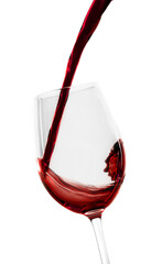 Sticker - Red wine pouring in glass on white, close-up view