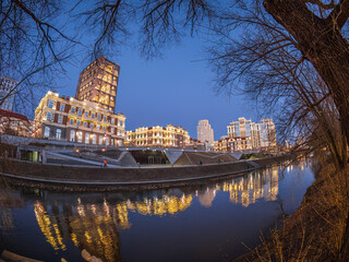 Late evening on a pond in the center of the city