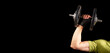 © valiantsin - Men arm hand lifting dumbbell close up. Ad banner, black background with space for text