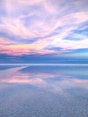 Canvas Print - Sunset sky over the sea water.