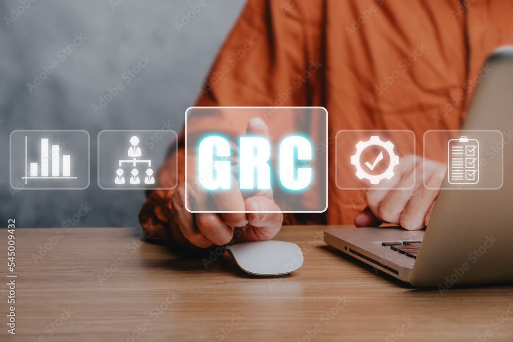Fotografie GRC, Governance Risk and Compliance concept, Business person ...
