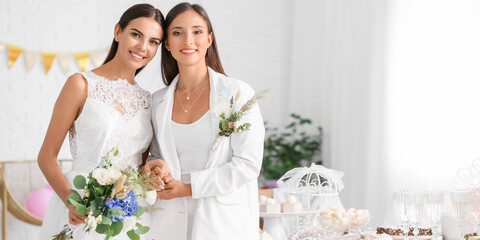 Canvas Print - Beautiful lesbian couple during wedding ceremony