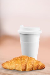 Sticker - Coffee paper cup with fresh tasty croissant