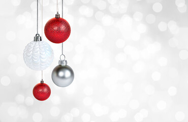 Wall Mural - red and white christmas ornaments on gray background closeup