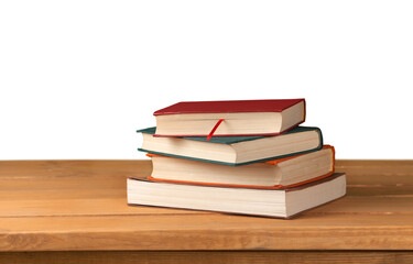 Canvas Print - Stack of books on table isolated on white background