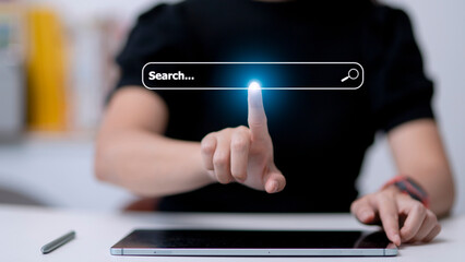 People hand using laptop or computor searching for information in internet online society web with search box icon and copyspace.