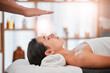 © Beaunitta V W/peopleimages.com - Reiki, energy and light with woman in spa for alternative medicine, spiritual and faith wellness. Health, relax and holistic therapy with hands of massage therapist for healing, peace and focus