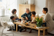 Family Spending Time Together In Living Room