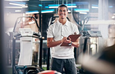 Poster - Gym, fitness and portrait of a personal trainer with a clipboard for a training consultation. Happy, smile and sports coach or athlete with a wellness, health and exercise checklist in workout center