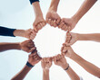 © Emily N/peopleimages.com - Hands, trust and support fist circle with low angle for loyalty, mission and friends with cooperation. Connection, hope and community of people together for social commitment, community and trust