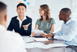 © Emily N/peopleimages.com - Office, team and meeting communication with question in boardroom with interracial finance staff. Cooperation, ideas and professional workforce discussion on financial work statistics documents.