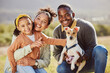 © S Fanti/peopleimages.com - Family, portrait and dog at park with girl and parents relax, bond and play, happy and smile in nature. Black family, pet and having fun on a field, embrace and enjoy quality time with jack russell