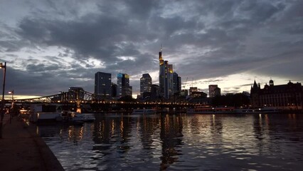 Wall Mural - Bridge over Main River and business centre buildings in Frankfurt, Germany