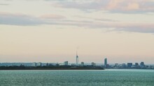 Portsmouth Spinnaker Tower City Skyline With Sunset Sky, Seen Across The Solent From Isle Of Wight In The English Channel, Part Of UK Coast