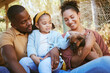 © S Fanti/peopleimages.com - Happy family, animal shelter and dog with girl and parents bond, relax and sharing moment of love, trust and care. Black family, animal rescue and puppy with family at shelter, playful, cute and joy
