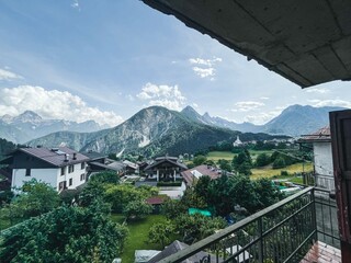 Leinwandbilder - Panoramic View On The Dolomites Mountains From The Apartment Window