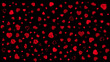 czerwone graficzne serca na czarnym tle o różnej wielkości