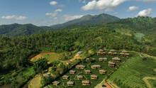 Aerial View Resort In Green Tea Plantation On The Hill At Ban Rak Thai Village, Chinese Style Hotel And Resort, Famous Tourist Attractions Is Another Landmark Of Mae Hong Son, Province Thailand