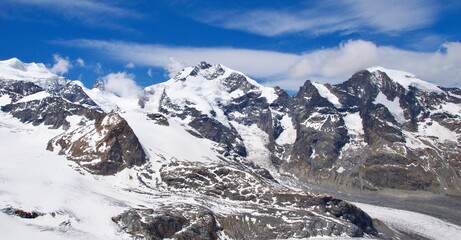 Wall Mural - Landscape of snow capped mountains of the Alps in Switzerland